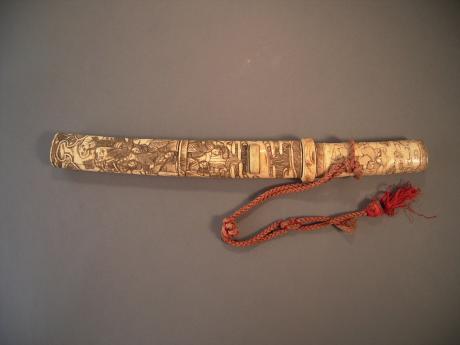 EARLY 20TH CENTURY SWORD WITH CARVED BONE HANDLE AND SHEATH  <br><font color=red><b>SOLD</b></font>