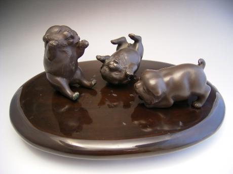 JAPANESE EARLY 20TH CENTURY TRIO OF BRONZE PUPPIES BY KOZAN<br><font color=red><b>SOLD</b></font>