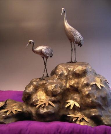JAPANESE MID 20TH CENTURY PURE SILVER CRANES AND BRONZE TORTOISE ON BRONZE BASE