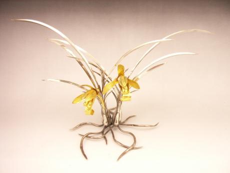 JAPANESE EARLY 20TH CENTURY PURE SILVER CYMBIDIUM ORCHID OKIMONO<br><font color=red><b>SOLD</b></font>